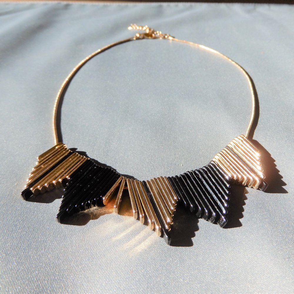 Gold and Black Colored necklace